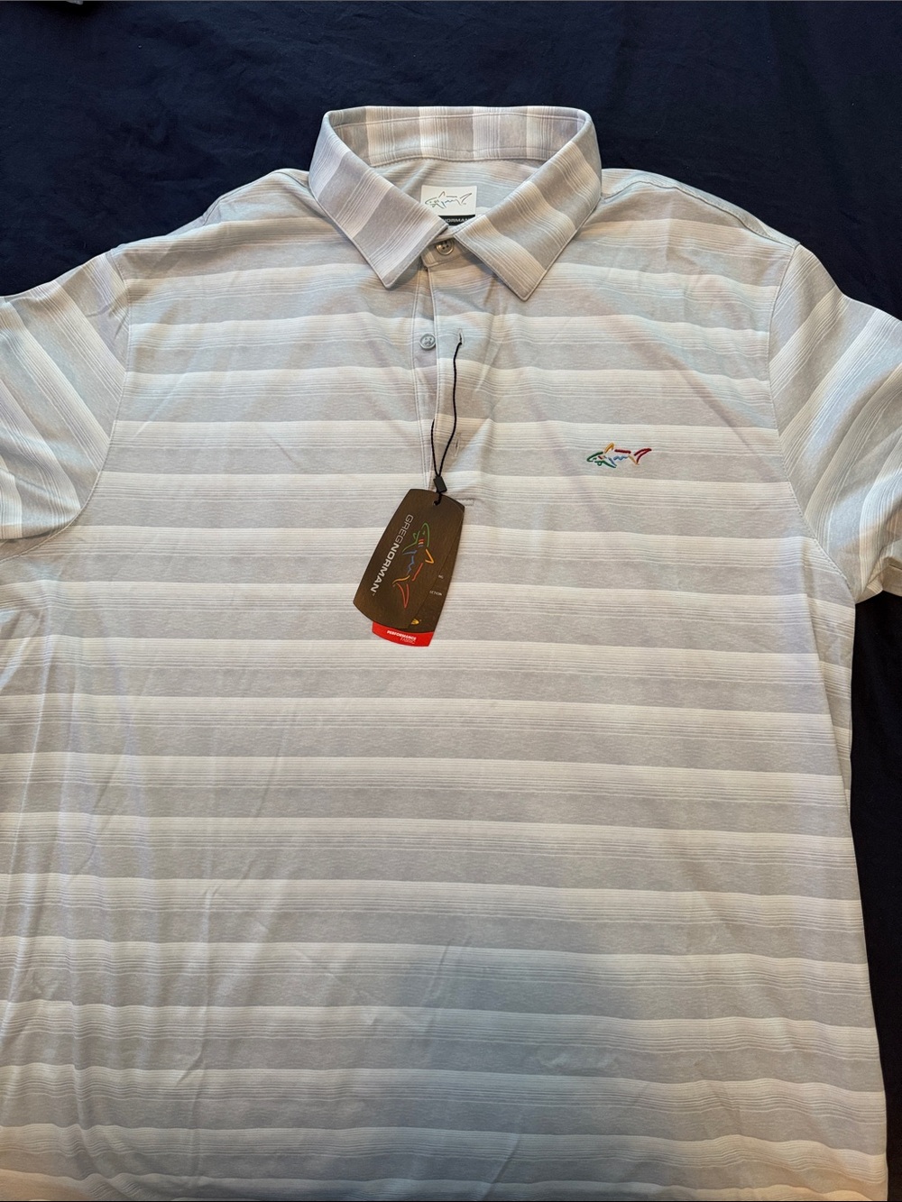 Greg Norman golf polo_ unworn with tags